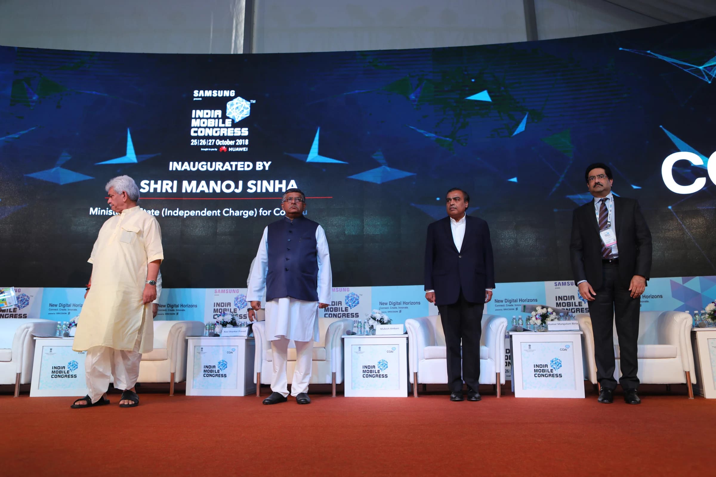 Mukesh Ambani and other industry and government leaders at the India Mobile Congress 2018 inauguration