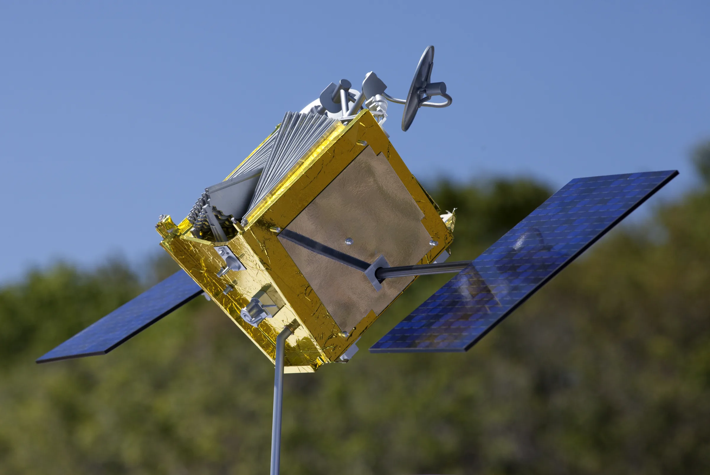 Low Earth orbit communications satellite with deployed solar panels