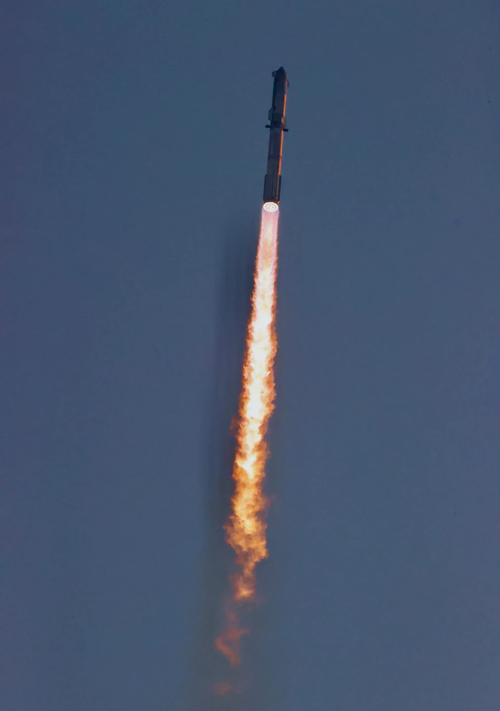 Starship ascending from Starbase during its fifth integrated flight test